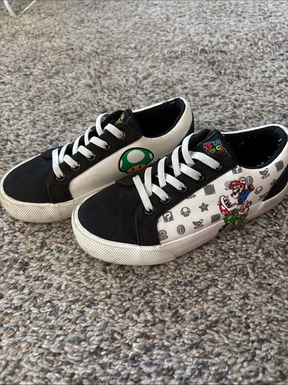 Nintendo Black and White Super Mario Kids Sneakers with Green 1-Up Mushroom